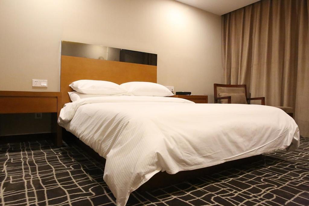 Days Inn Frontier Wuxi Уси Номер фото